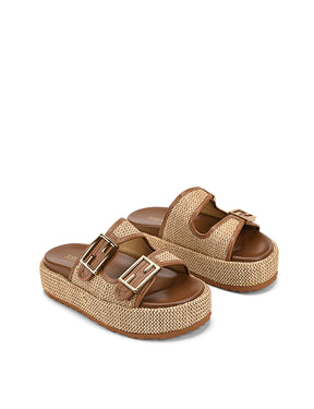 Women's natural weave raffia and tan leather platform footbed slides with gold buckles