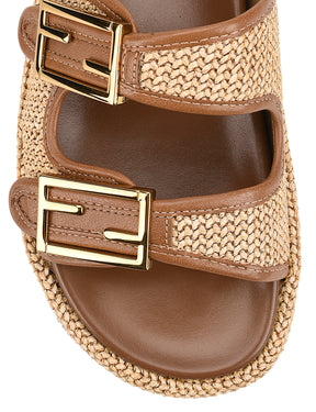 Women's natural weave raffia and tan leather platform footbed slides with gold buckles