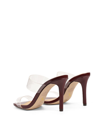 Women's red wine patent stiletto heel mule with clear vinylite upper