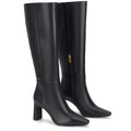 Women's black leather knee high boot with block heel and pointed toe