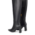 Women's black leather knee high boot with block heel and pointed toe