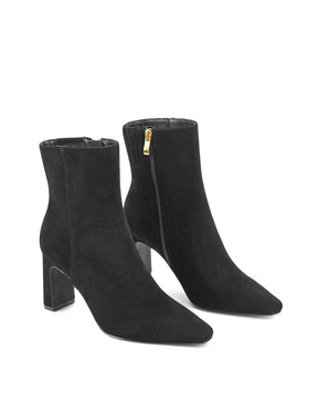 Women's black suede heeled ankle boot with pointed toe and thin block heel