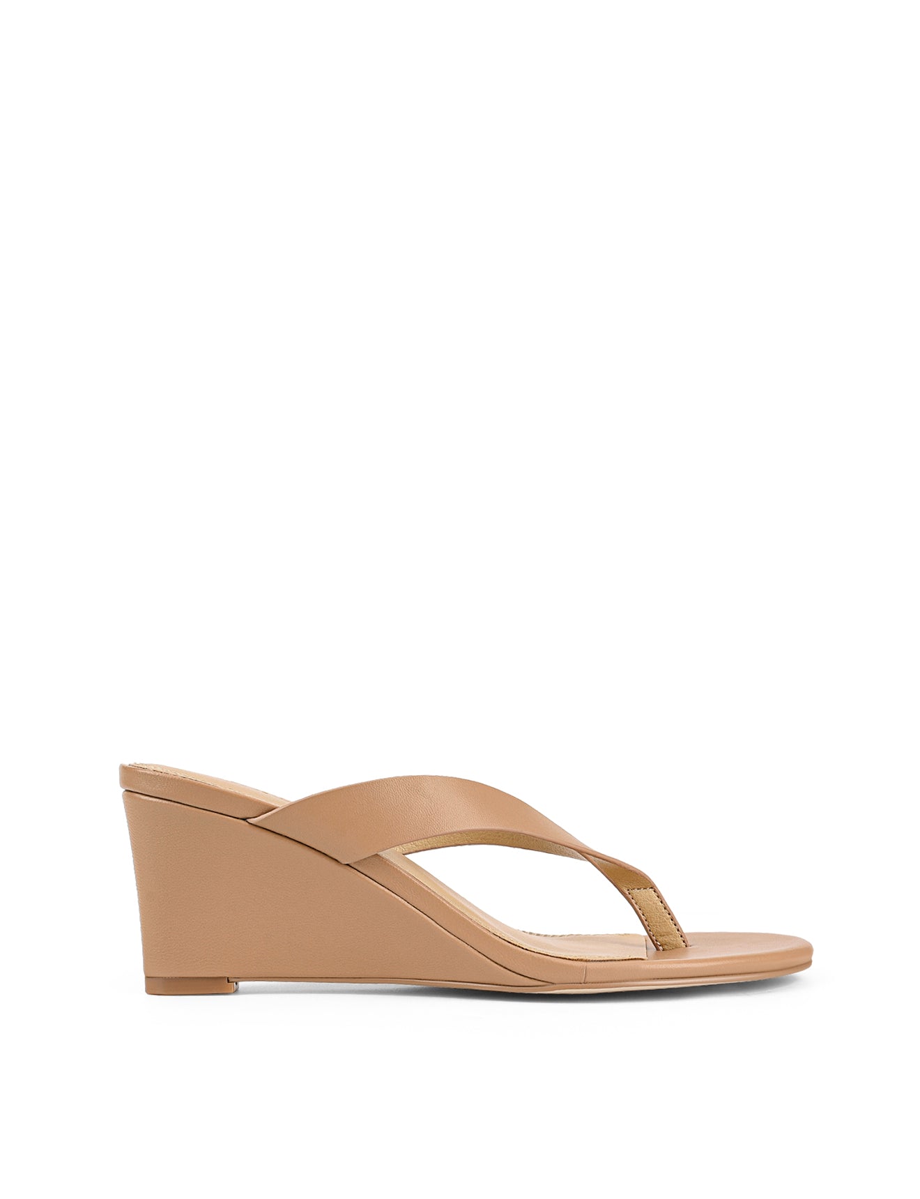 Women's wedge heeled thong in almond tan leather