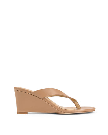 Women's wedge heeled thong in almond tan leather