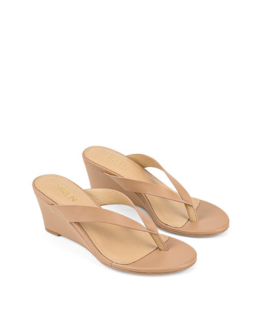 Women's wedge heeled thong in almond tan leather