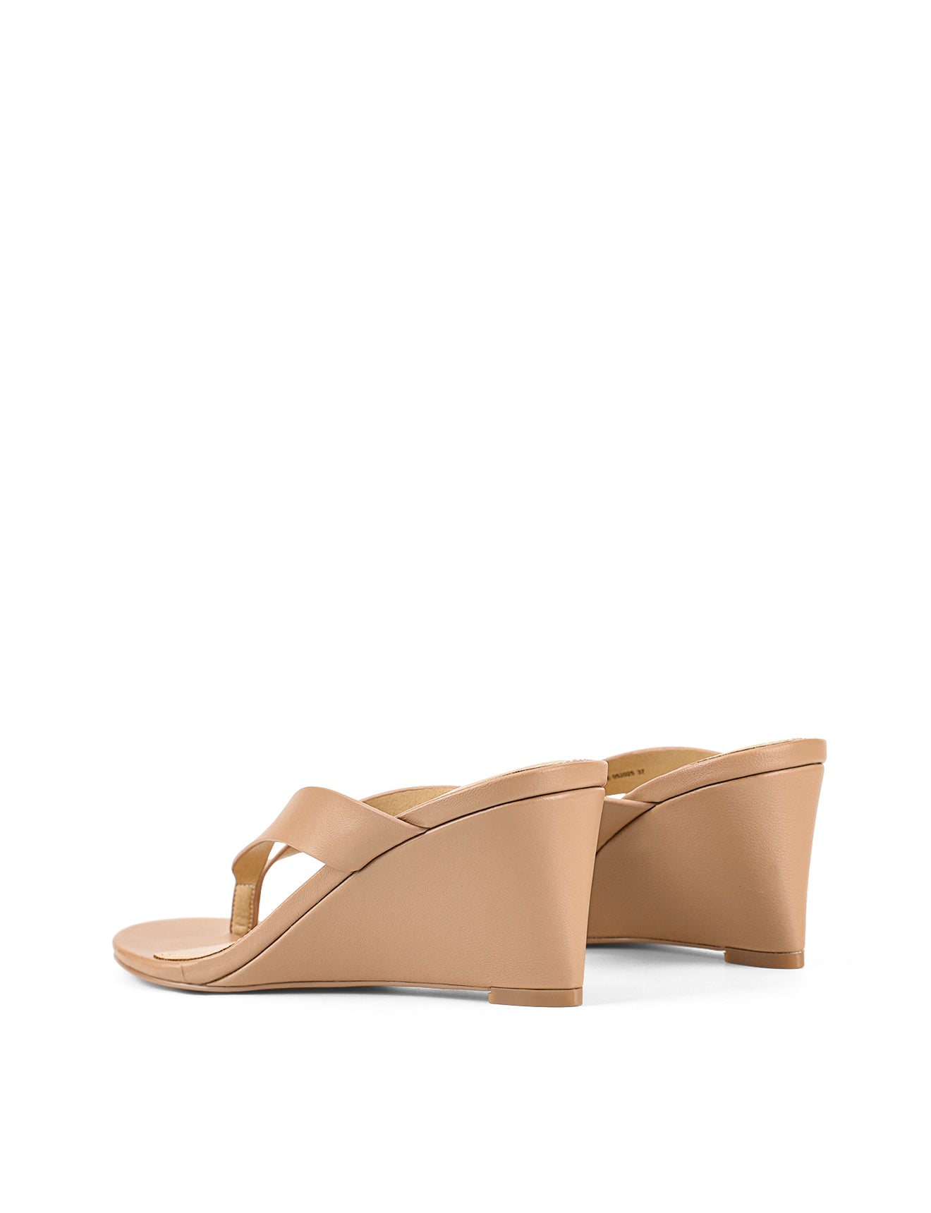 Women's wedge heeled thong in almond tan leather