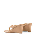 Women's wedge heeled thong in almond tan leather