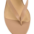 Women's wedge heeled thong in almond tan leather