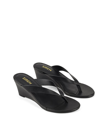 Women's wedge heeled thong in smooth black leather