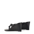 Women's wedge heeled thong in smooth black leather
