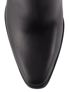 Womens Black leather ankle boot with inner zipper closure and subtle square toe shape
