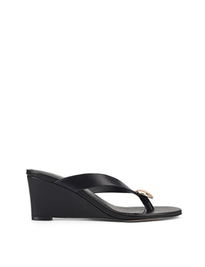 Women's black leather wedge thong sandal with gold accent
