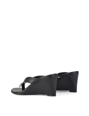 Women's black leather wedge thong sandal with gold accent
