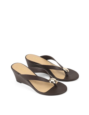 Women's chocolate brown leather wedge thong sandal with gold accent