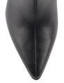 Women's high heel knee high boot with pointed toe and curved upper