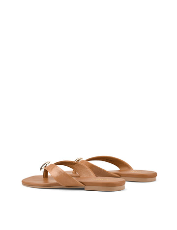 Women's tan leather flat thongs with gold embellishment 
