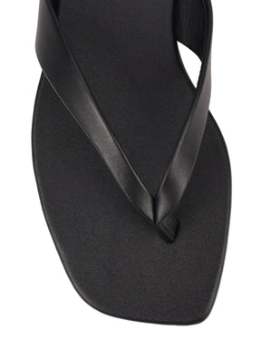 Women's black leather flat thongs 