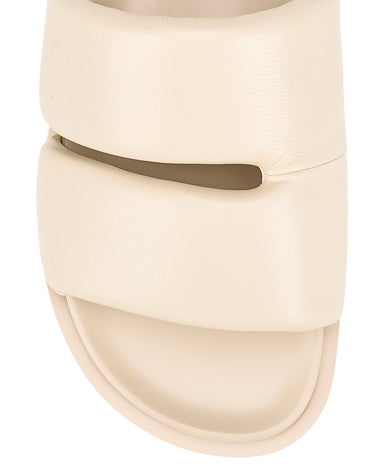 Women's beige leather footbed slide with puffy vamp upper