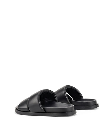 Women's black leather footbed slide with puffy vamp upper