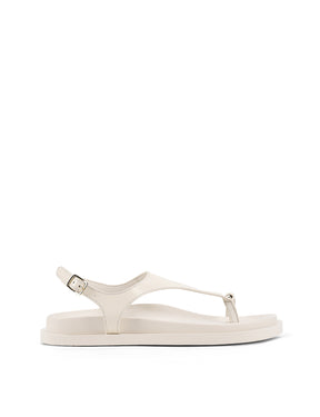 Women's white cream leather sandal with footbed sole and gold accent details