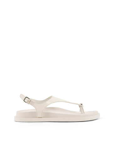 Women's white cream leather sandal with footbed sole and gold accent details