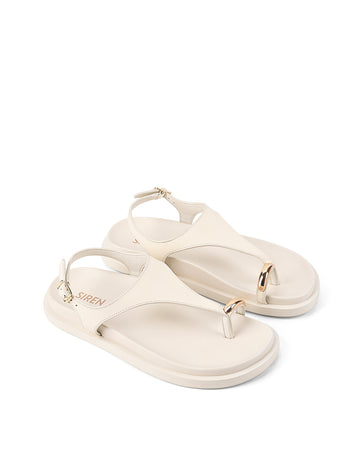 Women's white cream leather sandal with footbed sole and gold accent details