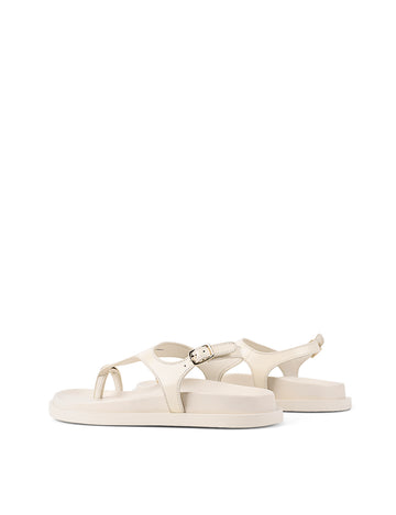 Women's white cream leather sandal with footbed sole and gold accent details