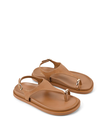 Women's tan leather sandal with footbed sole and gold toe ring