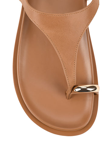 Women's tan leather sandal with footbed sole and gold toe ring