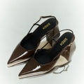 Women's chocolate brown patent leather slingback block heel with buckle fastening and pointed toe