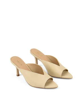 Women's heeled mule with v cut upper and pointed toe in custard yellow leather