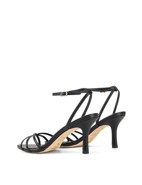 Women's Black high-heeled leather sandal on a white background