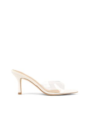 Women's low mid heel mules in chalk white leather with pointed toe and clear vinylite upper