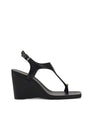Women's black leather heeled wedge with gold metal toe ring details