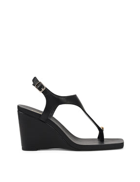 Women's black leather heeled wedge with gold metal toe ring details