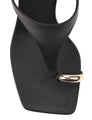 Women's black leather heeled wedge with gold metal toe ring details