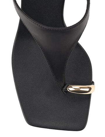 Women's black leather heeled wedge with gold metal toe ring details