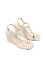 Women's cream white leather heeled wedge with gold metal toe ring details