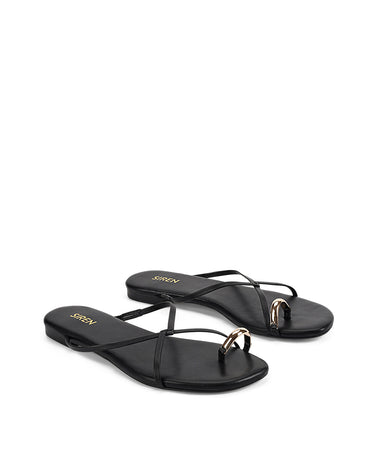 Women's black leather strappy flats with gold toe ring