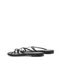 Women's black leather strappy flats with gold toe ring