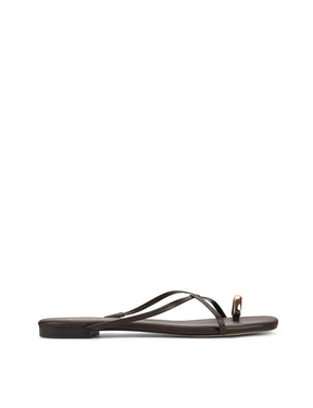 Women's flat strappy sandal with gold metallic toe ring in chocolate brown leather