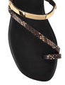 Women's black leather and brown snake flat slide with gold metallic embellishment, dainty straps and toe ring
