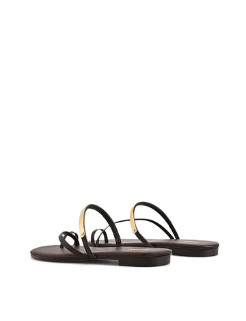 Women's chocolate brown leather flat slide with gold metallic embellishment, dainty straps and toe ring