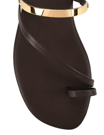 Women's chocolate brown leather flat slide with gold metallic embellishment, dainty straps and toe ring