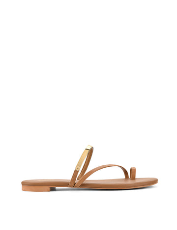 Women's brown tan leather flat slide with gold metallic embellishment, dainty straps and toe ring