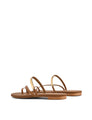 Women's brown tan leather flat slide with gold metallic embellishment, dainty straps and toe ring