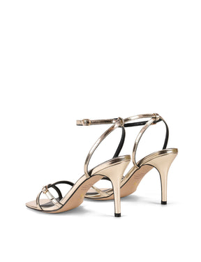 Women's gold mirror metallic strappy stiletto heels with buckle embellishment