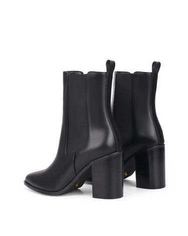 Women's black leather chelsea booth with stacked block heel, pointed toe and elastic gusset