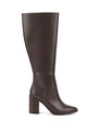 Women's leather knee high boots with stacked leather block high heel and pointed toe and inner zipper.