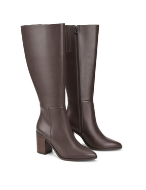 Women's leather knee high boots with stacked leather block high heel and pointed toe and inner zipper.